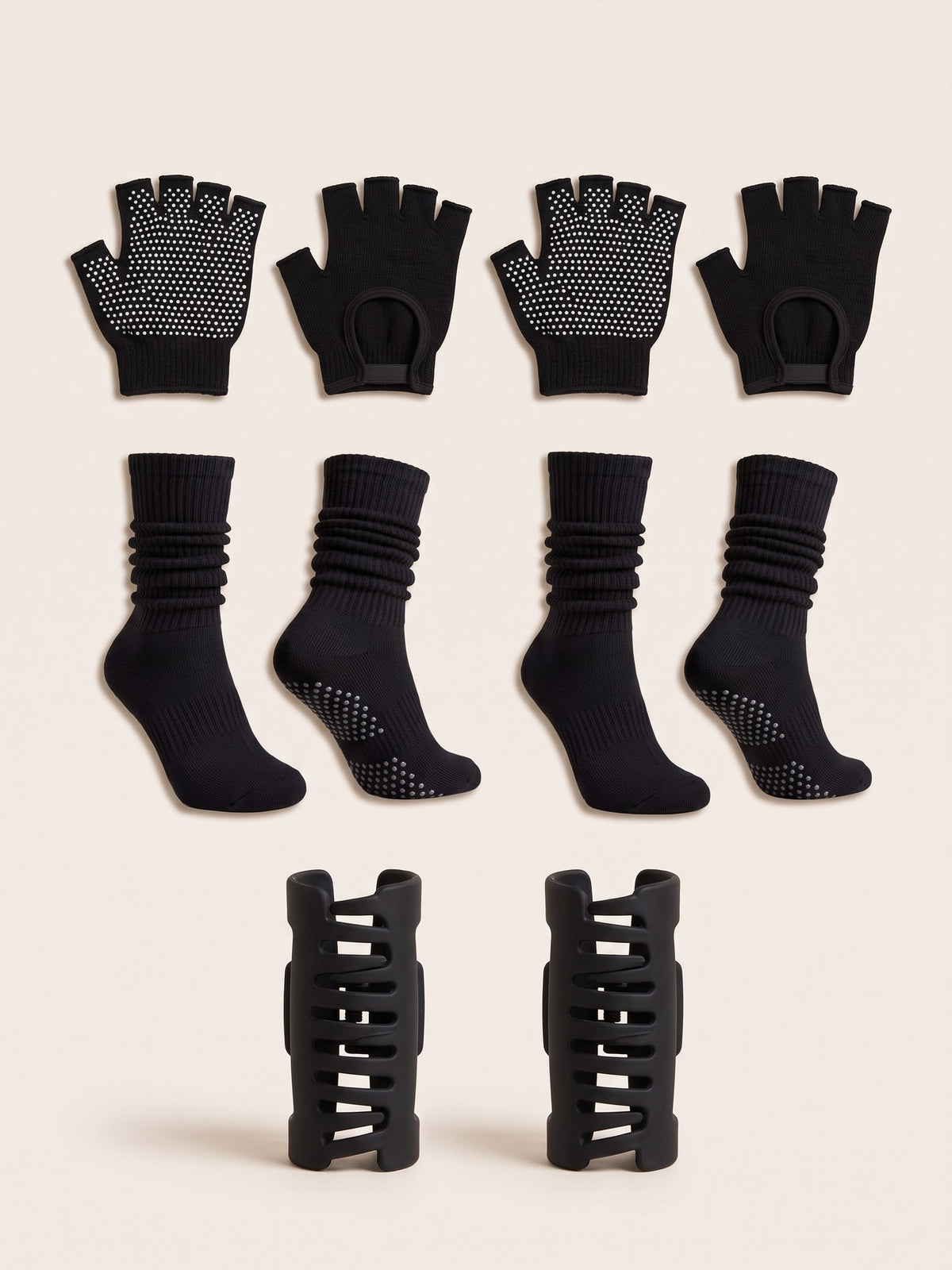Black gloves, socks and SoftClip 2-Pack laid flat together in matching black