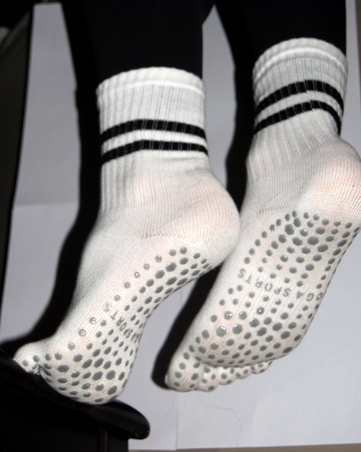 SoftGrip Stripey Socks white on feet, supplier text visible, pending removal