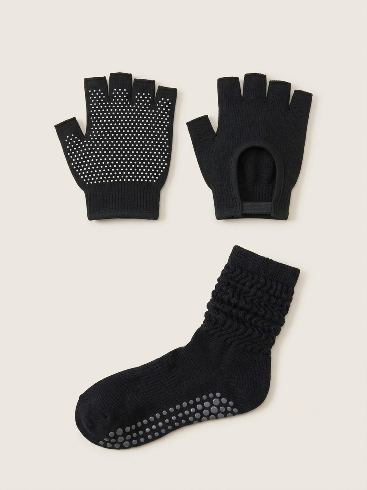 Starter Set in Black: one pair of black SoftGrip half-finger gloves and one black Scrunch grip sock